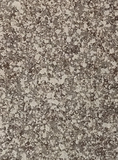 Picture showing the Small Sedona countertop surface pattern. In this image you can see a gray background with small white and red spots 