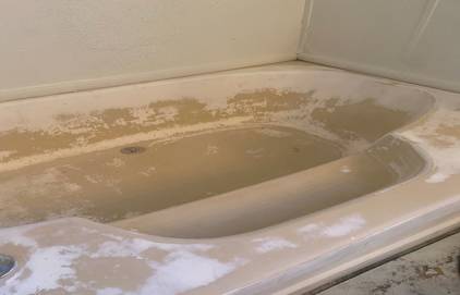Before picture of bath tub refinishing. you can see the bath tub is looking old and damaged.