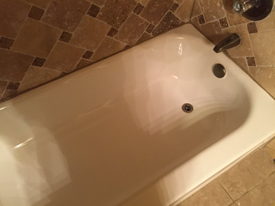 Picture of a bathtub that looks great and inviting. 