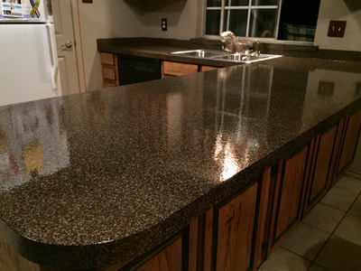 After picture of a beautiful refinished kitchen countertop with a sable stone finish.