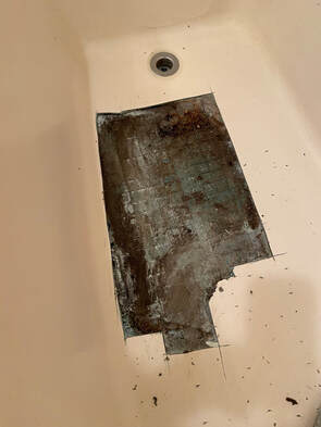 Picture a bathtub that is being repaired. To start the refinishing process, the rotten parts need to be removed. 