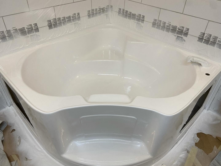 Picture of a bathtub that has been refinished by a professional bathtub resurfacing contractor. It is always a good idea to hire a professional. Messing with DIY resurfacing kits might cost you more money and time in the long run. 